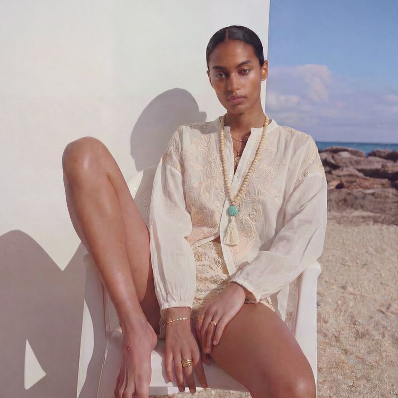 completo a due pezzi con camicia a maniche lunghe e pantaloncino corto