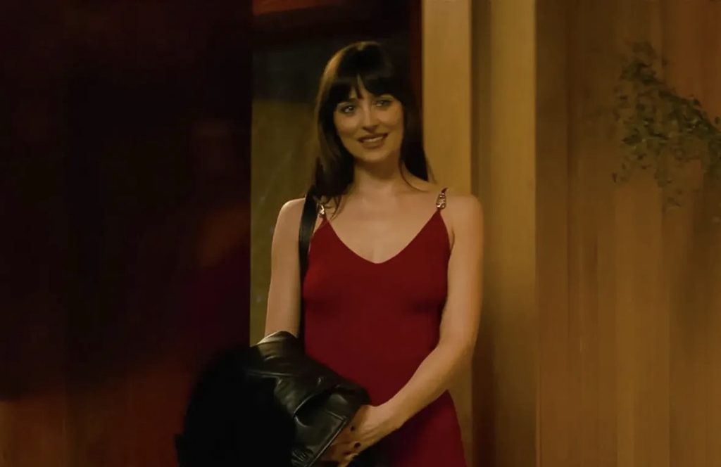Dakota Johnson in Verity movie scene with Versace Dress